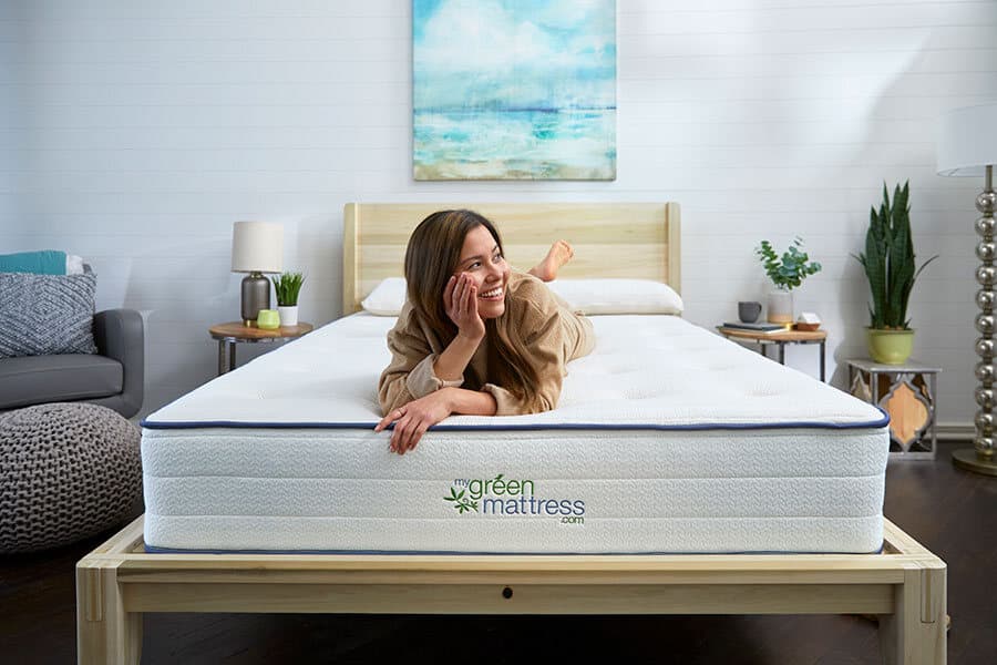 Kiwi Organic Mattress with woman resting on top