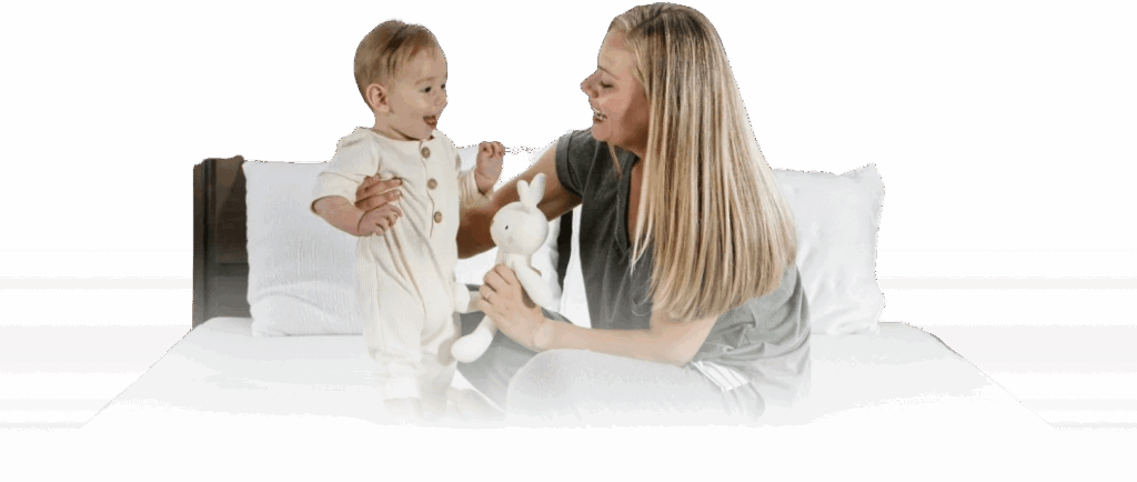 Mother and son playing on organic green mattress