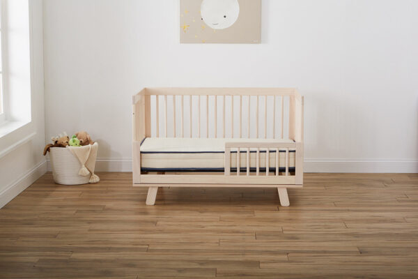Emily organic crib mattress in nursery by My Green Mattress