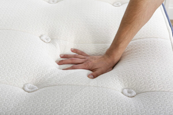 Close-up of Pure Eco plush organic kids mattress with quilted top