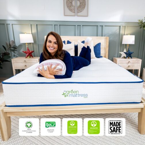 Model laying on the Kiwi Organic Mattress next to organic certification seals, showcasing its USA-made, chemical-free construction.