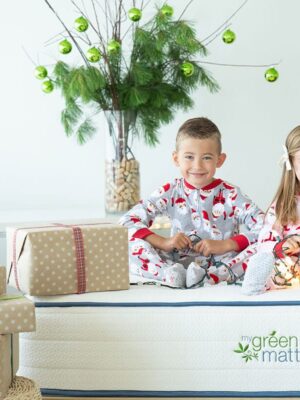 Kids on mattress with gifts