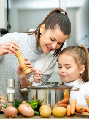 mom and child cooking together