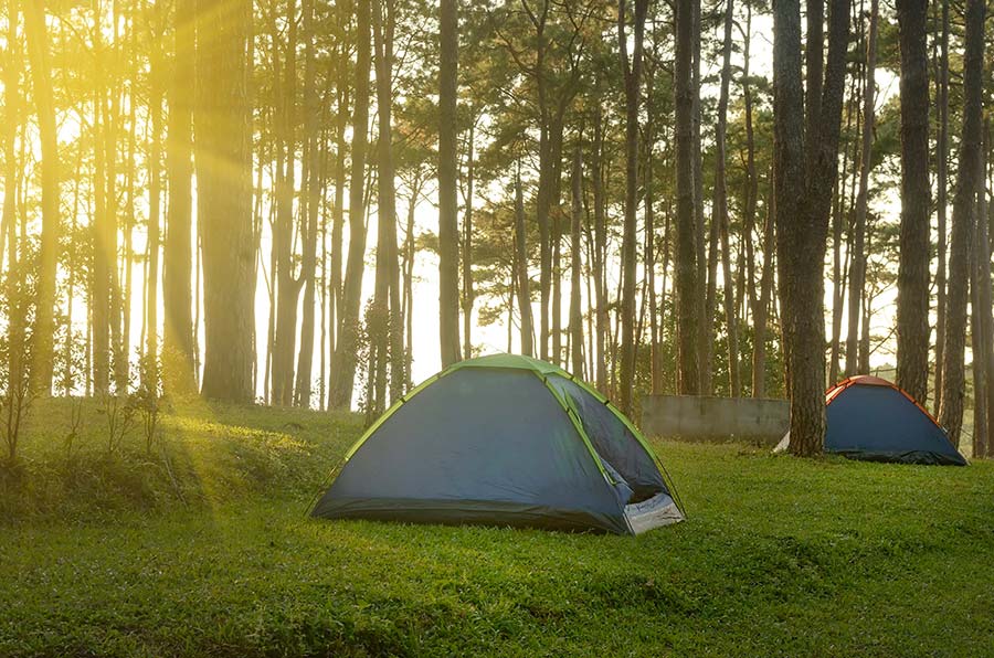 How to Sleep Better While Camping (or Glamping!) This Spring