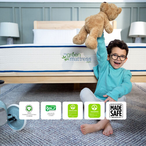 A smiling child sitting beside the Pure Eco Organic Kids Mattress, shown with GOTS, GOLS, GREENGUARD Gold, UL Validated, and MADE SAFE certifications highlighting the mattress’s organic, nontoxic safety.