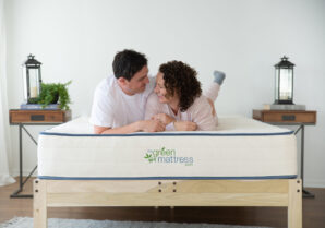 two-people-laughing-on-a-mattress
