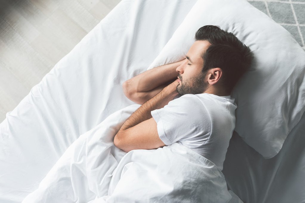 overhead view of man sleeping